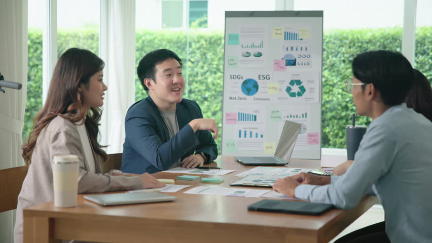 Happy workplace diverse team group young adult gen Z asia people man woman candid work at office class enjoy talk laugh relax idea advice in go green eco friendly future growth worker mental health.