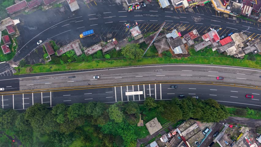 Stunning drone shots of misty roads winding through a Mexican forest