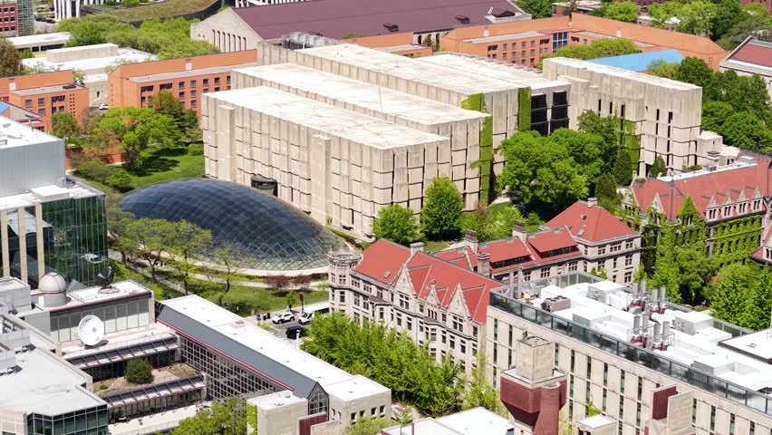 University of Chicago Campus, Drone Shot of Modern Library Buildings and Dormitories Behind Vintage Gothic Halls