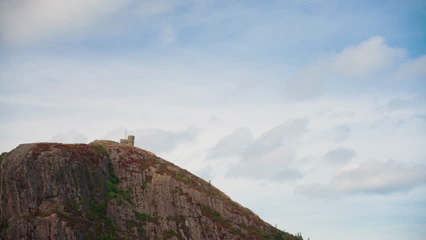 Aerial shot looking at castle from lower portion of mountain on a cloudy autumn day. Signal Hill Newfoundland,Canada