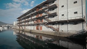 A symbolic warehouse floating on the Otaru Canal, capturing a historic and striking scene. - Powered by Shutterstock - Get 15% off with code: PIKWIZARD15