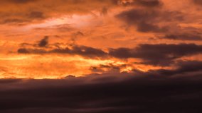 Majestic Sunset Clouds Transforming in a Breathtaking Display of Colors. Vibrant Sunset Painting Sky with Dramatic Orange, Purple, and Grey Hues, Revealing Mesmerizing Cloud Formations Transforming - Powered by Shutterstock - Get 15% off with code: PIKWIZARD15