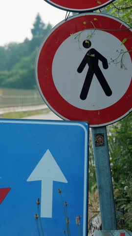 Traffic sign. blue square with red and white arrows. Road works sign. close-up. Repair work is underway on the road. Attention. road repair. big bridge in the alpine mountains. summer day.