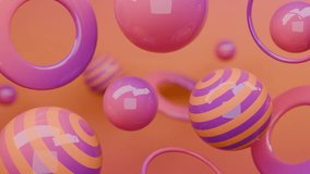 Abstract 3D Pink and purple spheres and rings float on an orange background. 4K seamless abstract 3D loop video. - Powered by Shutterstock - Get 15% off with code: PIKWIZARD15