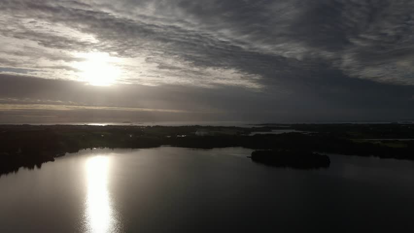 Drone Aerials Over a Lake with Reflective Water