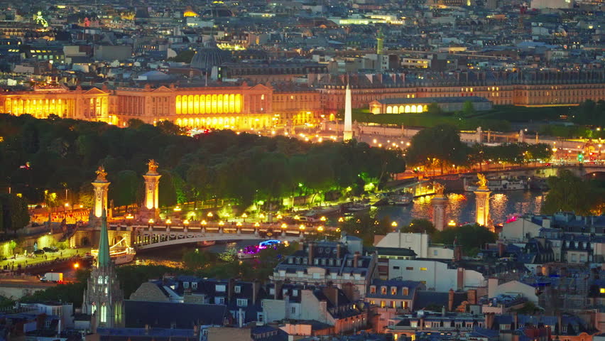 View from above of the famous bridge over the Seine River. Paris city center in summer