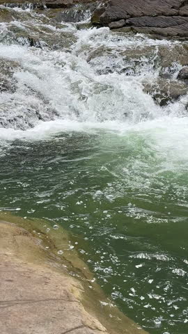 Mountain river. Wild mountain river flowing through stone boulders