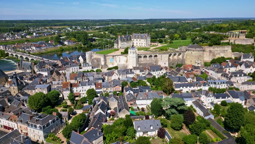 Smooth panoramic backward drone fly from the iconic Amboise Castle aka Chateau royal d
