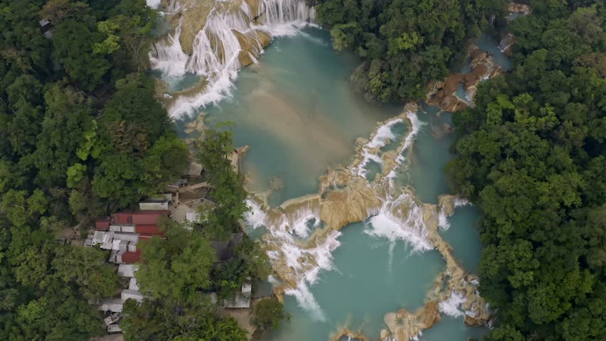 This drone shot provides a closer, stunning view of the iconic Cascadas de Agua Azul in Chiapas, Mexico.