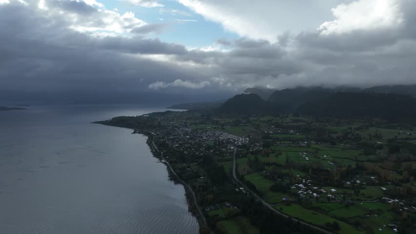 Aerial View of Ranco Lake with Forest Mountains and Blue Sky Southern Chile 