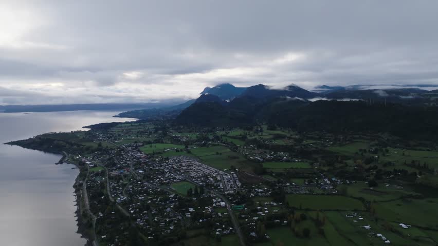 Aerial View of Ranco Lake with Forest Mountains and Blue Sky Southern Chile 