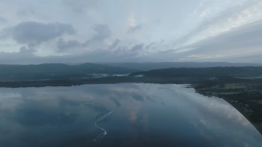 Aerial View of Ranco Lake with Forest Mountains and Blue Sky Southern Chile 