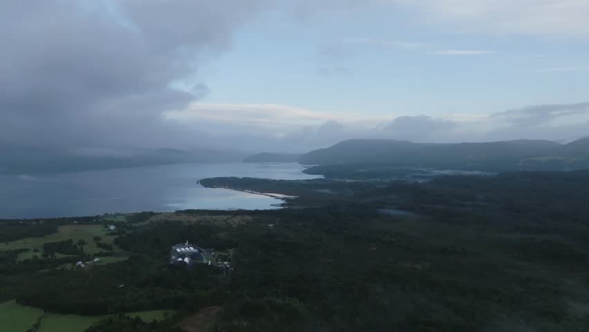 Aerial View of Ranco Lake with Forest Mountains and Blue Sky Southern Chile 