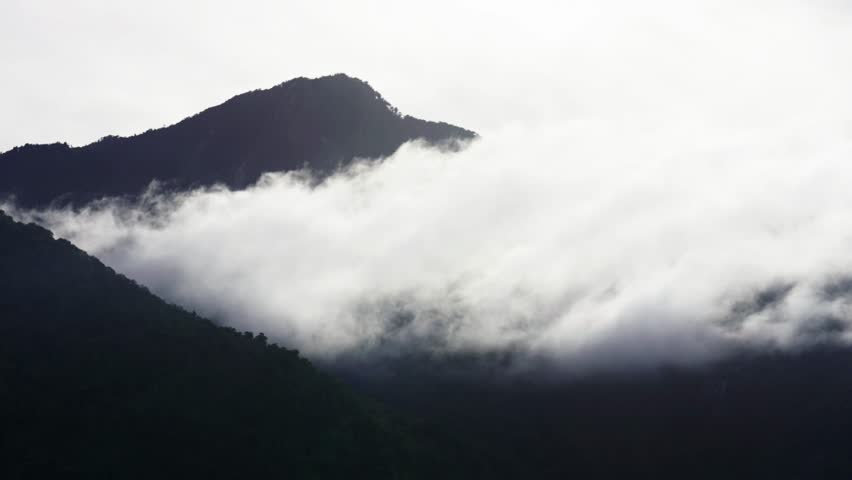 Foggy Mountain Landscape with Backlight