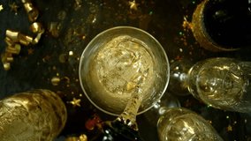 Super slow motion of camera movement into glass of champagne . Unique angle ,concept of celebration and success . Filmed on high speed cinema camera , 1000 fps - Powered by Shutterstock - Get 15% off with code: PIKWIZARD15