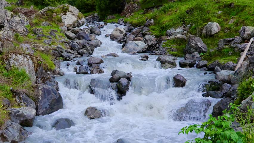 Mountain Stream Carving Through the Rocks, Switzerland. August 15, 2025