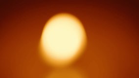 Defocused Light from Candle Flame Creating Soft Warm Orb in Abstract Frame, Macro, Orange Tone, Mood Lighting Concept. - Powered by Shutterstock - Get 15% off with code: PIKWIZARD15