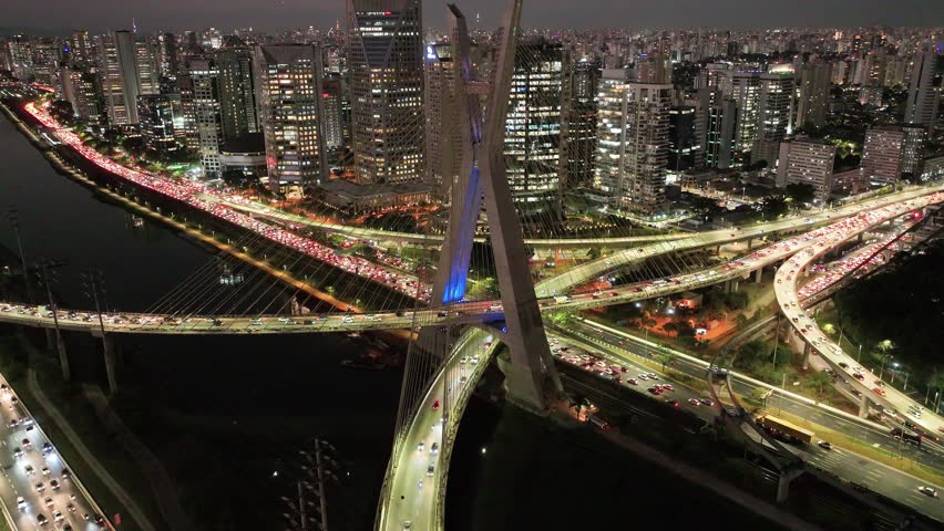 Cable Bridge In Night City Sao Paulo Brazil. Iconic Structure Of Bridge Connecting Landmarks Streets. Night Expressway Downtown Cityscape. Night Panning Wide. Cities Of The World.