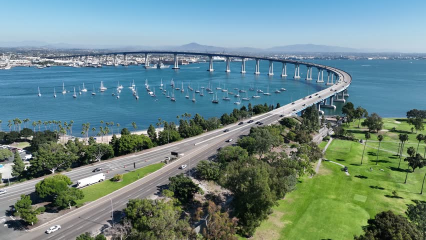 Conorado Bay Bridge In San Diego California United States. Aerial View Of Landmark Bridge Showcasing Its Intricate Design . Metropolitan Landscape Company Building Beautiful.