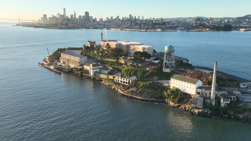 Sunset Alcatraz Island In San Francisco California United States. Aerial View Of A High-Rise Buildings And Traffic Showcasing Urban Life. Building Landscape Bird View Beautiful.