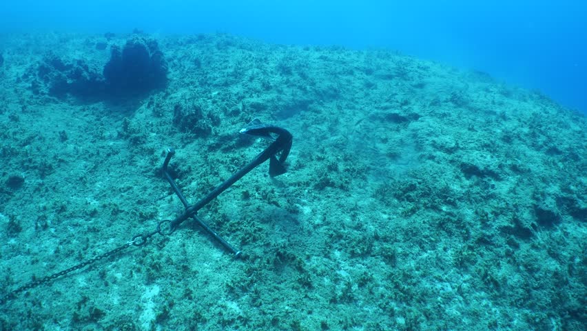the anchor is underwater damaging habitat, harmfull for the natural environment 