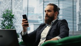 Director engaging in an executive phone call discussion with a financial broker, sharing insight on market forecasts and investment strategy, demonstrating his eye for business ideas. Camera B. - Powered by Shutterstock - Get 15% off with code: PIKWIZARD15