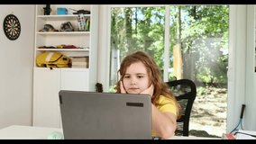 Child on online school lesson. Kid learning on laptop e-learning. Teen student learn lesson on laptop. - Powered by Shutterstock - Get 15% off with code: PIKWIZARD15