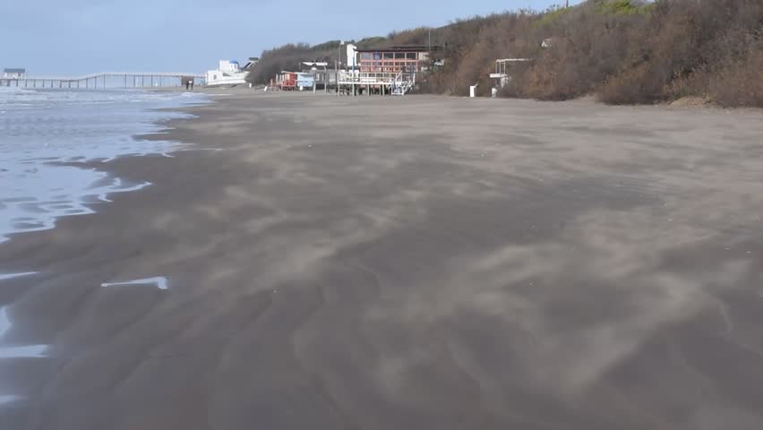Windy day, sand waving in Aguas Verdes Beach (Argentina)