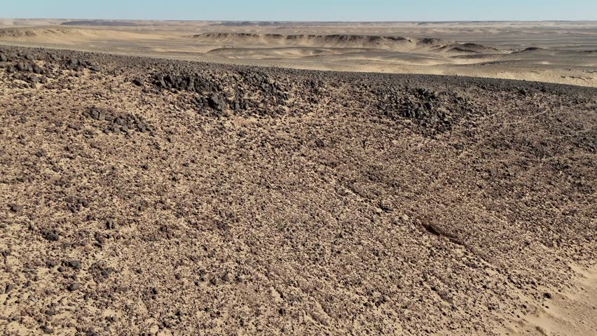 Aerial drone view of the Eye of the Sahara, Richat Structure in Mauritania. Unique circular geological formation in the desert landscape of the Sahara