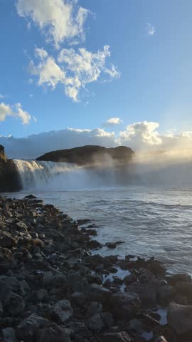 Mythic Goðafoss Iceland waterfall at sunset, where Norse gods yielded to Christianity, a stunning and historic vista perfect for travel storytelling.