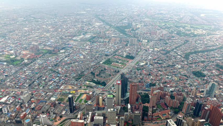 Stunning drone footage of Bogota, Colombia, showcasing the cityscape, skyline, and Plaza Cultural de la Santamaría from above, perfect for travel and cultural projects.