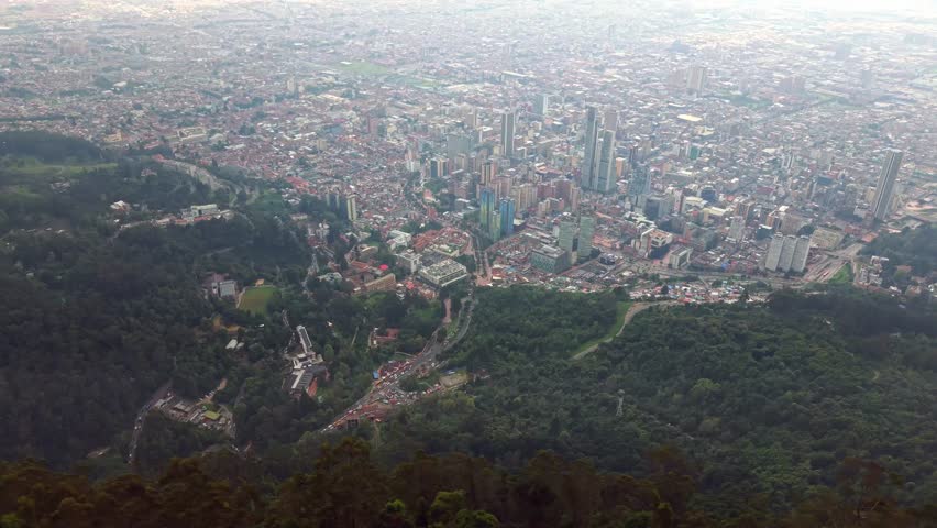 Stunning drone footage of Bogota’s university area in Colombia, including Monserrate, campus buildings, and the vibrant urban skyline from above.