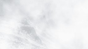 Snow Covered Mountain Peaks in Heavy Winter Storm, Misty Snowy Mountains with Dense Winter Clouds - Powered by Shutterstock - Get 15% off with code: PIKWIZARD15