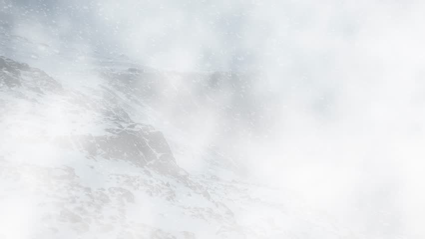 Snow Covered Mountain Peaks in Heavy Winter Storm, Misty Snowy Mountains with Dense Winter Clouds