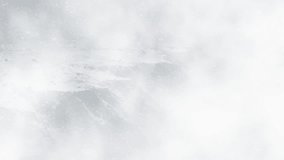 Snow Covered Mountain Peaks in Heavy Winter Storm, Misty Snowy Mountains with Dense Winter Clouds - Powered by Shutterstock - Get 15% off with code: PIKWIZARD15