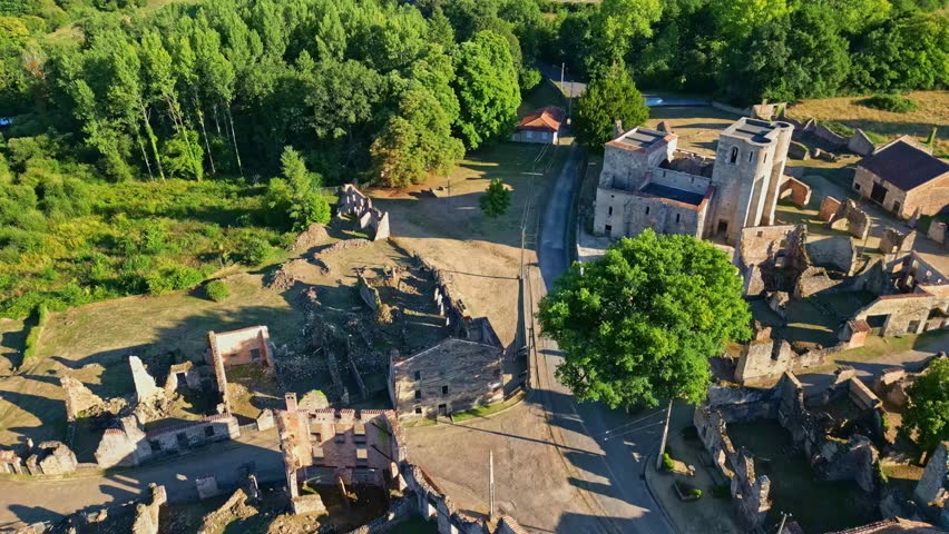 Drone fly over the historic stone ruins of Village martyr d'Oradour-sur-Glane, Haute-Vienne, France.