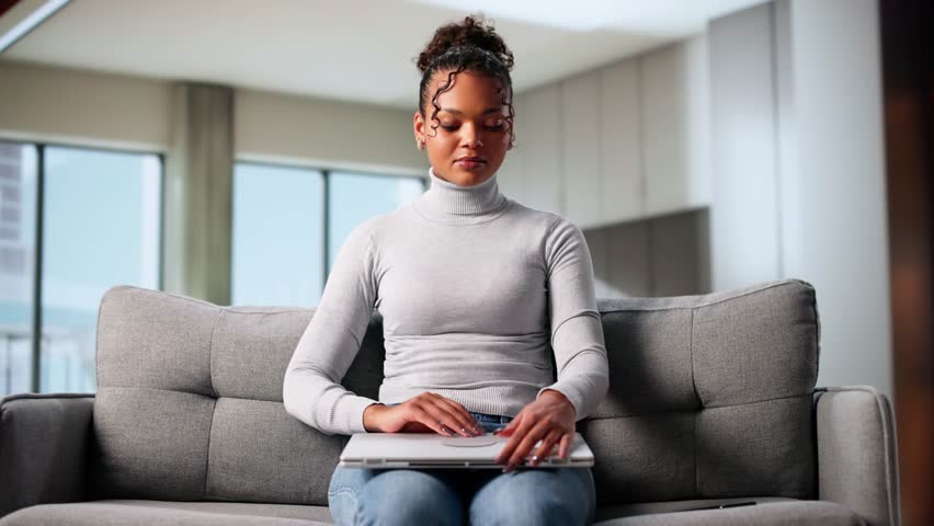 Woman Joinning Online Virtual Conference Webinar For Remote Office Workers Using Laptop