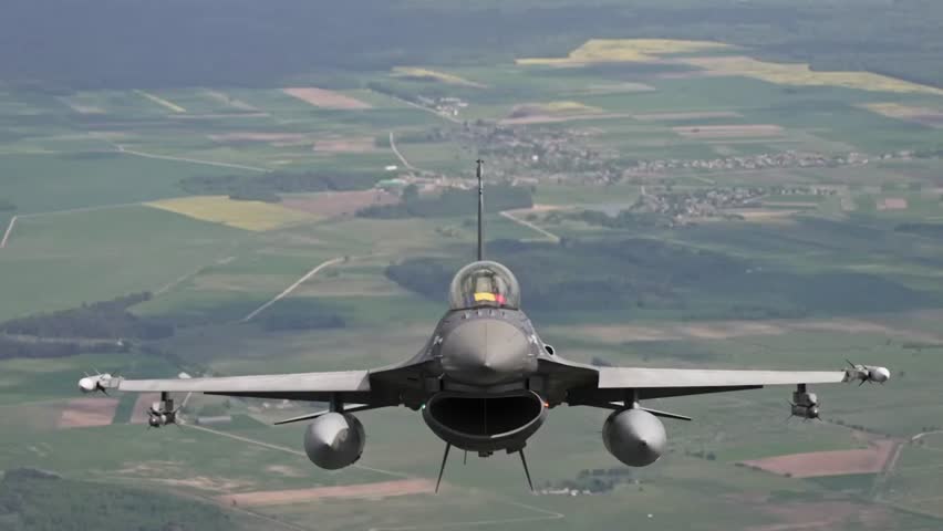 ROMANIAN AIR FORCE F-16 FLIES OVER LITHUANIA