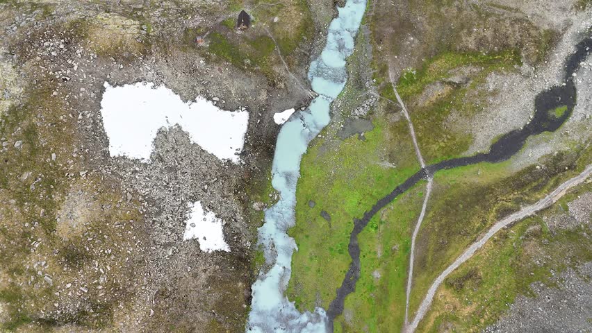 Scenic Flight over glacial river near Crow Pass in Chugach State Park