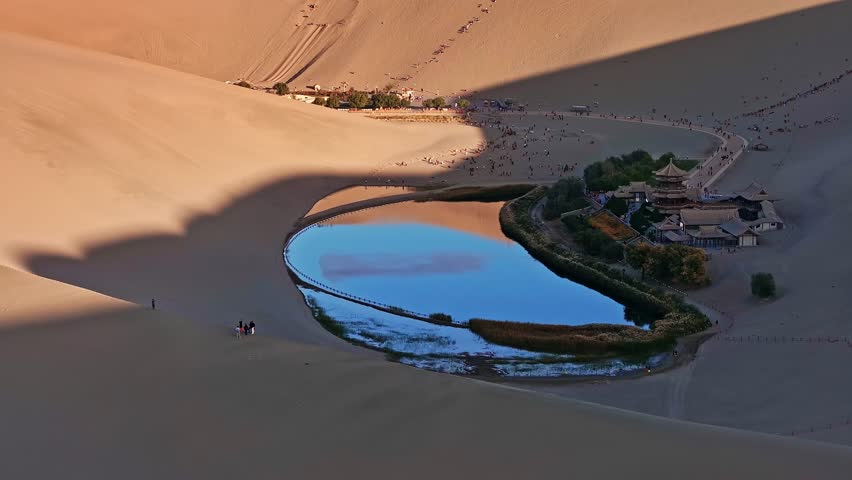 aerial view of the beautiful crescent moon spring, famous tourist destination on the silk road, dunhuang city, gansu province, China.