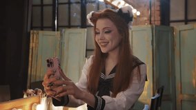 Cosplayer girl video calling on smartphone backstage - Powered by Shutterstock - Get 15% off with code: PIKWIZARD15