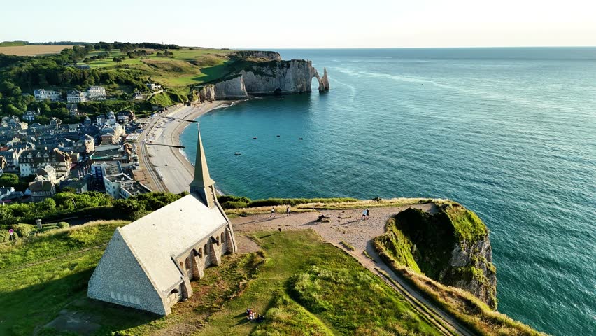 Aerial view of Etretat showcasing stunning cliffs, beach, and coastal landscape in France