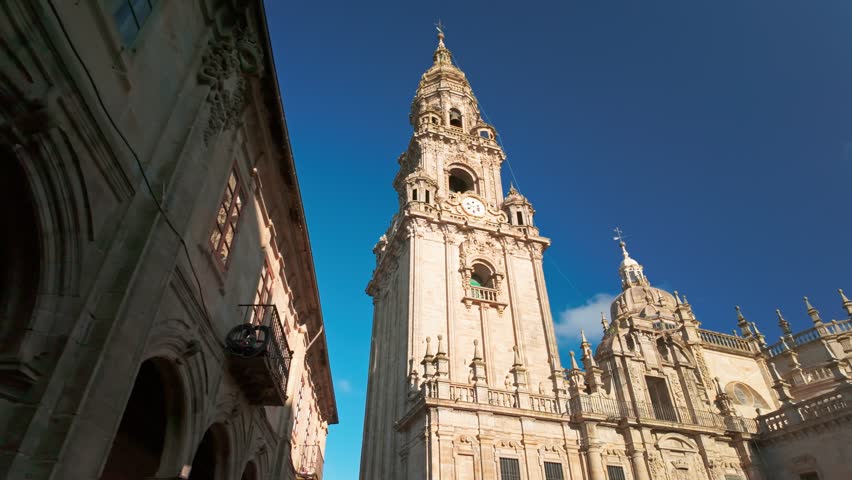 Revealing footage of the Cathedral of Santiago de Compostela at sunrise in Galicia, Northern Spain. Renowned Christian pilgrimage site and final destination of the historic Camino de Santiago route.