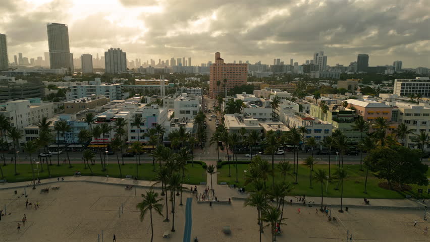South Beach Miami with Palm Trees Architecture and Sunset Drone View