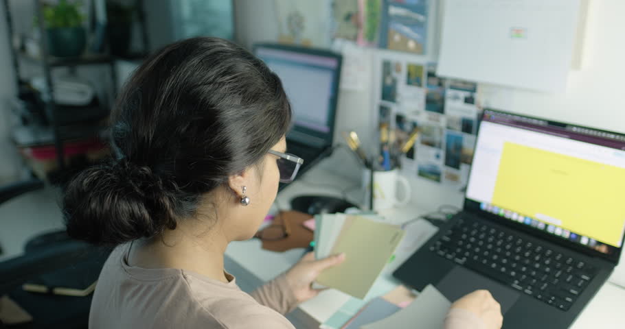 Interior designer lifestyle with paint swatches, project planning, hustle mentality and long hours of creative work, office and corporate stock video pro res 422