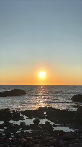 Twilight Glow Above Coastal Rocks