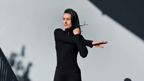 Sport woman athlete girl stretching arms for start of fitness workout training warm up ready to yoga practice fit exercise preparation female confident in urban city outdoors sportswoman wellness - Powered by Shutterstock - Get 15% off with code: PIKWIZARD15