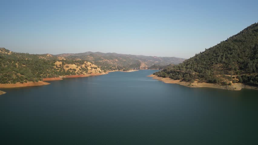 Aerial of Don Pedro lake in northern California near Jamestown on hazy day