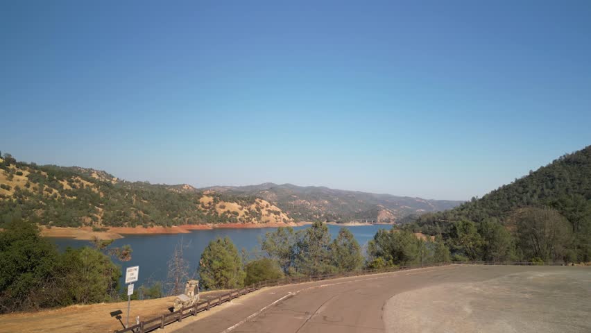 Aerial of Don Pedro Lake in California near Moccasin on hazy day