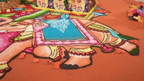 A colorful rangoli floor design featuring a decorated elephant motif, bright geometric patterns, and lush flower arrangements. Ideal for festival themes, cultural events, weddings, and festive Indian  - Powered by Shutterstock - Get 15% off with code: PIKWIZARD15